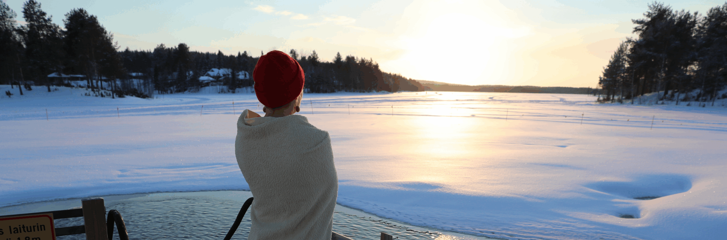 An ice swimmer enjoys the lake view.